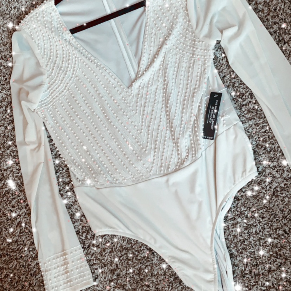 Cream bodysuit with detailed beading